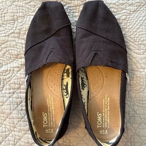 TOMS Black Canvas Slip-Ons